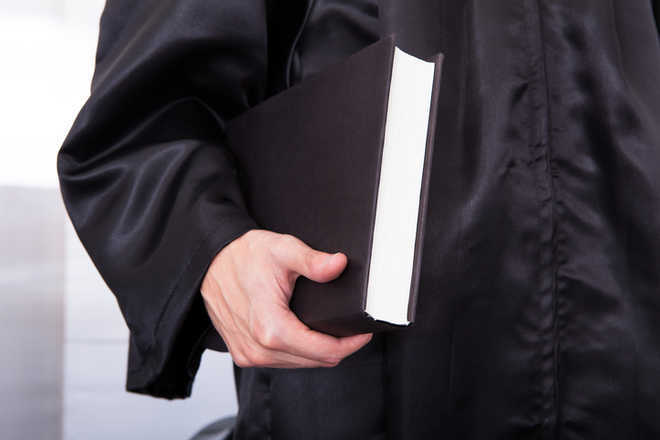 Lawyers Seek Exemption From Wearing Black Coats