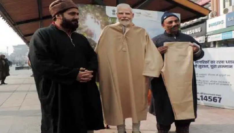 PM's Life-Size Cut-Out Adorned With 'Pheran' In Srinagar